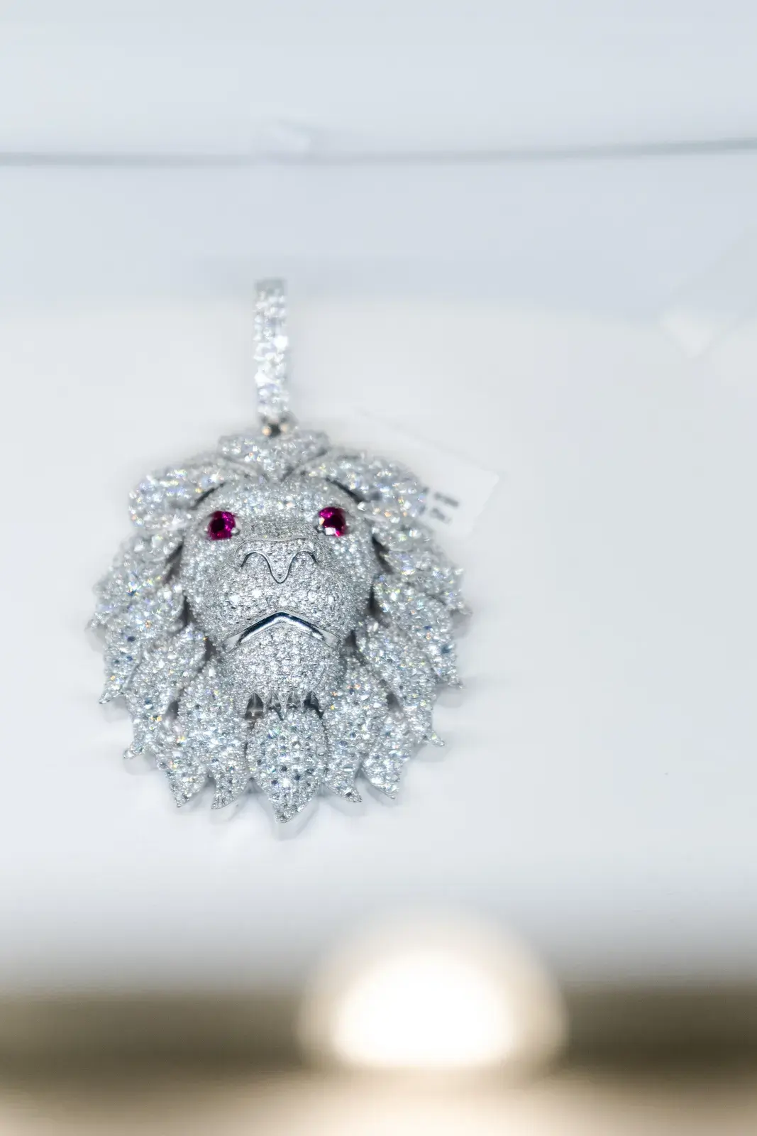 A pave diamond lion pendant, custom work at King's Jeweler